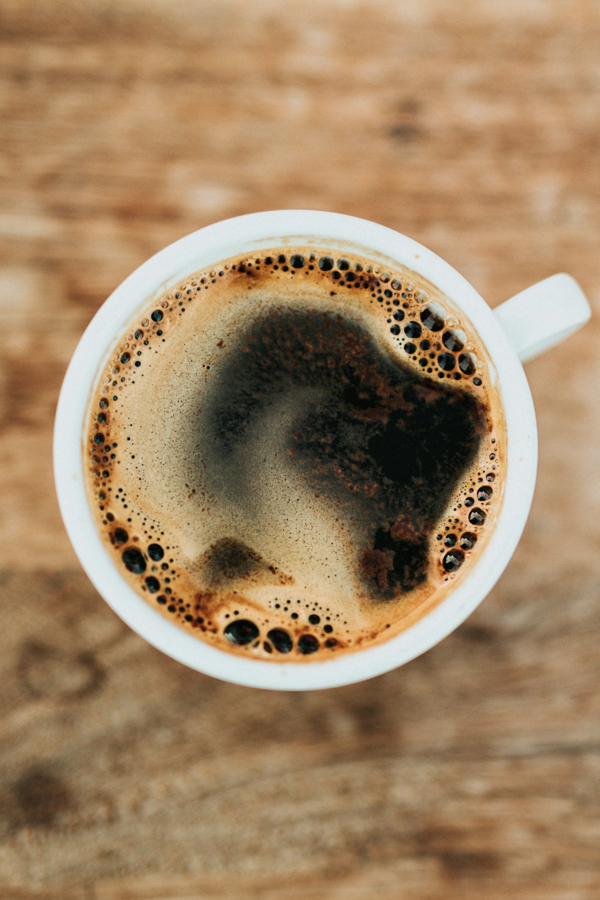 Close-up of kopi cup and saucer